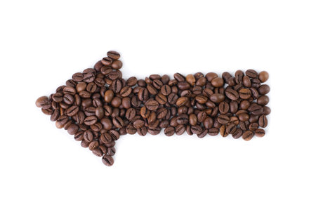 Arrow from the coffee beans isolated on whiteの写真素材