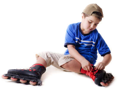 little boy on roller skates の写真素材