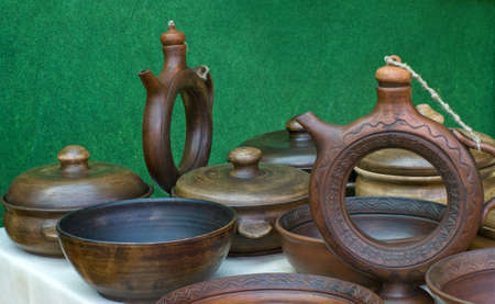 ceramics are for sale at an outdoor market の写真素材