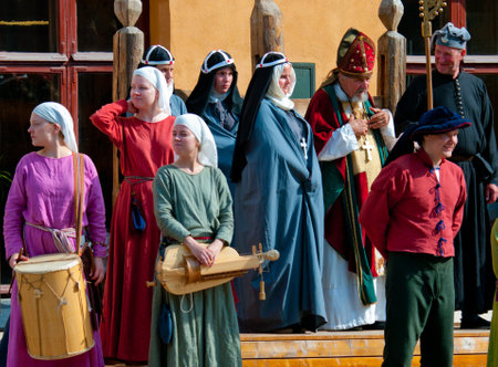TURKU, FINLAND 30 JUNE  The Medieval Market of Turku is historical reenactment event and includes a handicrafts market with participants garbed in period costumes, on june 30, 2013 in Turku, Finland のeditorial素材