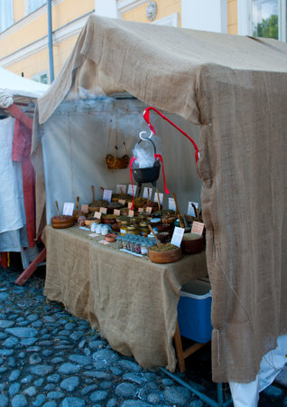 TURKU, FINLAND 30 JUNE  The Medieval Market of Turku is historical reenactment event and includes a handicrafts market with participants garbed in period costumes, on june 30, 2013 in Turku, Finland のeditorial素材