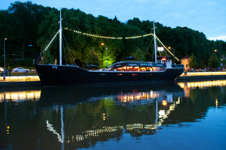 TURKU, FINLAND 29 JUNE: View to the Aura river at night in Turku,Finland on 29 june, 2013. Nightlife on the banks of river Aura, where are bars and restaurants. Turku is  one of popular tourist destinations. のeditorial素材