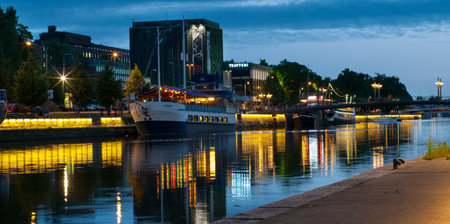 TURKU, FINLAND 29 JUNE: View to the Aura river at night in Turku,Finland on 29 june, 2013. Nightlife on the banks of river Aura, where are bars and restaurants. Turku is  one of popular tourist destinations. のeditorial素材