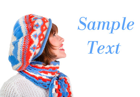 Pretty woman in winter outfits on a white background  Sample text space to the rightの写真素材