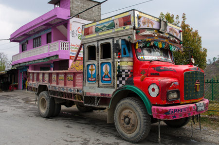 
POKHARA, NEPAL - MARCH 25, 2014: Nepalese colorful truck on the road on  March 3, 2014, in Pokhara, Nepal.のeditorial素材