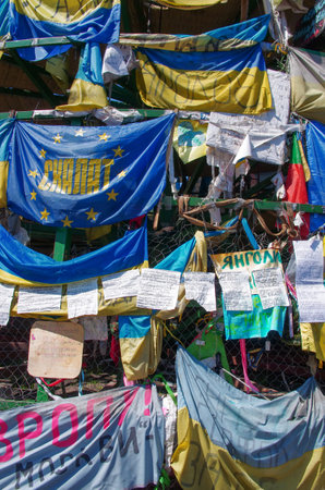 KIEV (KYIV), UKRAINE - MAY 11, 2014:  Christmas tree with national flags and placards on Maidan in Kiev, Ukraine.のeditorial素材