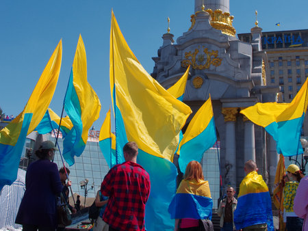 KIEV (KYIV), UKRAINE - MAY 11, 2014: People on the Maidan with inverted flag of Ukraine.のeditorial素材