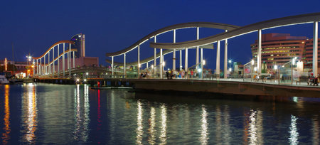 BARCELONA, SPAIN - JULY 10, 2014: Marina Port Vell and the Rambla del Mar at dusk in Barcelona, Catalonia, Spain on July 10, 2014. のeditorial素材