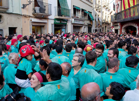 TORREDEMBARRA, SPAIN - JULY 13, 2014: Castells Performance   in Torredembarra, Catalonia, Spain. A Castell is a  Human Tower  built traditionally in Catalonia. のeditorial素材