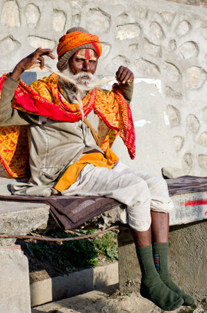 KATHMANDU, NEPAL - MARCH 03: Sadhu with traditional painted face at Pashupatinath Temple in Kathmandu, Nepal on March 03, 2014.のeditorial素材