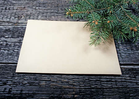 Card with  Christmas tree on wooden backgroundの写真素材