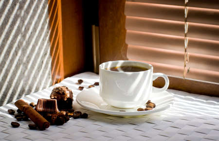 tea cup against the background of blindsの写真素材