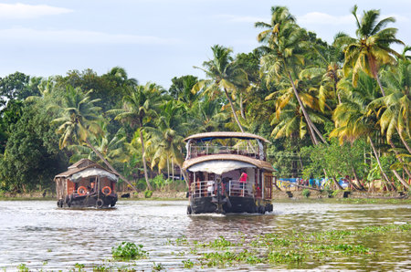 Kerala, India - October 18: Traditional Indian houseboat near Alleppey  on Kerala backwaters on October 18, 2014.のeditorial素材