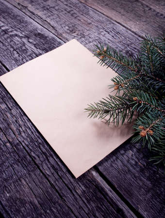 Card with  Christmas tree on wooden backgroundの写真素材