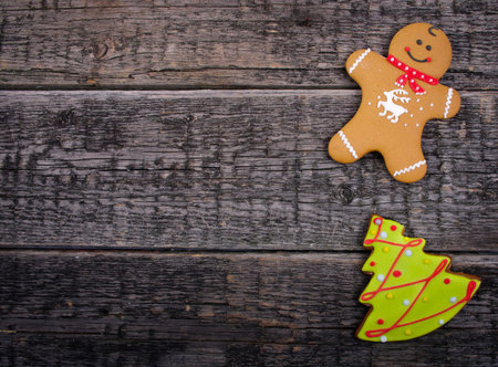 Christmas homemade gingerbread  cookies over wooden background