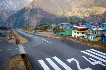 LUKLA, NEPAL - MARCH 4:  Tenzing-Hillary Airport  the most dangerous airport in the world on March 4, 2014 in Lukla, Nepal.のeditorial素材