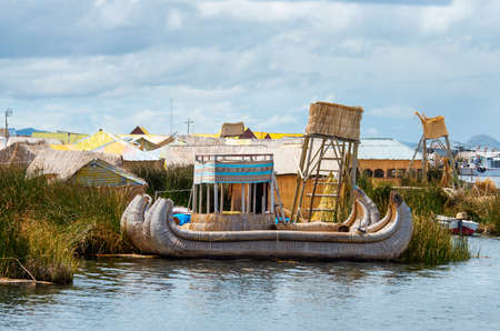 Traditional village on floating islands on lake Titicaca in Peru, South Americaの写真素材