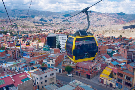 LA PAZ, BOLIVIA - APR 03, 2015: Cable cars carry passengers in La Paz. Aerial cable car of urban transit system opened in 2014 in the Bolivian city of La Paz.のeditorial素材