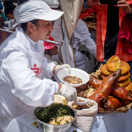 CUSZO, PERU - MARCH 08, 2015: A food seller woman at market in Cuzco, Peruのeditorial素材