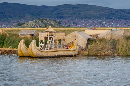 Traditional village on floating Uros  islands on lake Titicaca in Peru, South Americaの写真素材