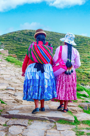 Island of the Sun, Bolivia-March 22, 2015: Bolivian  women in traditional clothes on the street .のeditorial素材