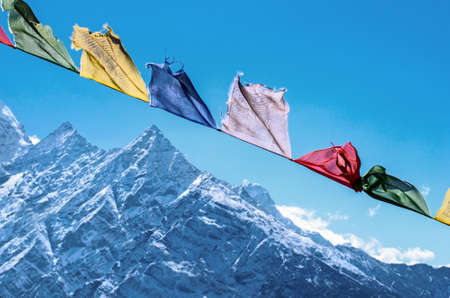 Buddhist prayer flags in the Himalaya mountains, in Nepalの写真素材