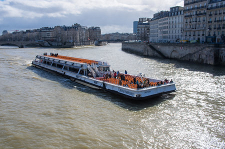 Paris, France - March 2, 2015: Boat tour on Seine river in Paris, Franceのeditorial素材