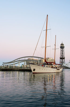 BARCELONA, SPAIN - JULY 10, 2014: Marina Port Vell and the Rambla del Mar at dusk in Barcelona, Catalonia, Spain on July 10, 2014.のeditorial素材