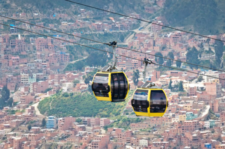 LA PAZ, BOLIVIA - APR 03, 2015: Cable cars carry passengers in La Paz. Aerial cable car of urban transit system opened in 2014 in the Bolivian city of La Paz.のeditorial素材