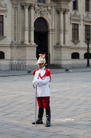 Lima, Peru - March 6, 2015: The Government Palace at Plaza de Armas with guards in Lima, Peruのeditorial素材