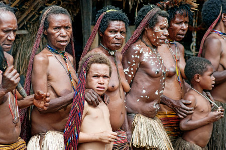 PAPUA PROVINCE, INDONESIA -DEC 28: Unidentified members of a Papuan tribe at New Guinea Island, Indonesia on December 28, 2010のeditorial素材