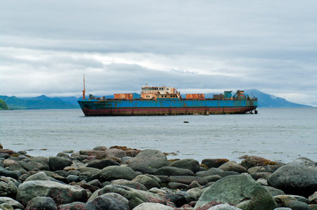 Abandoned transport refrigerator Sungach run aground during a storm near the island Paramushir