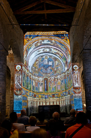 TAULL, SPAIN - JULY 18, 2014: Church Sant Climent de Taull. The hypothetical reconstruction of the entire ensemble fresco paintings (projection show).のeditorial素材