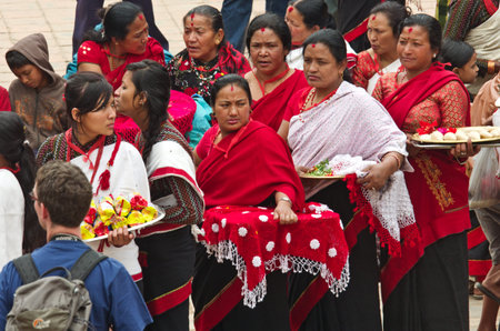 Bhaktapur, Nepal - April 05, 2014: A large crowd on the street festival in Bhaktapur Durbar square...