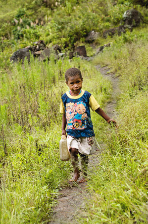 Papua Province, Indonesia - Circa January 2011: Unidentified children on the street in Wamena, on New Guinea Island, Indonesia .のeditorial素材