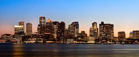 View of Financial District and Harbor at sunset in Boston, Massachusetts, USAの写真素材