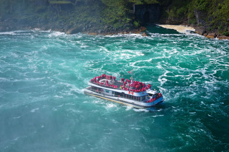 Niagara Falls, Canada - September 25, 2016: Boat Hornblower with tourists at the bottom of Horseshoe waterfall. Niagara Falls, Canada.のeditorial素材
