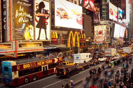 New York City, USA - October 13, 2016: Times Square crowds and traffic at evening. Times Square is...