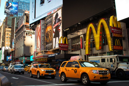 New York City, USA - October 15, 2016: New York yellow cabs going through Time Square. Times Square...