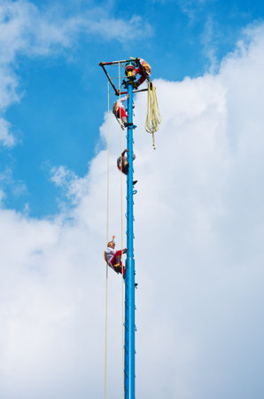 Mexico City, Mexico - November 15, 2016: Danza de los Voladores (Dance of the Flyers)- flying men performing the "voladores" ritual in Chapultepec in Mexico Cityのeditorial素材