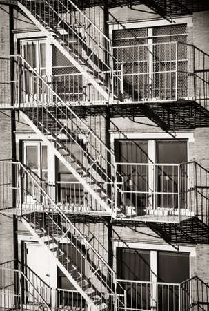 New York City view of exterior of a building with old fire escape.の写真素材