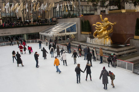 New York City - December 16, 2016: Ice skate at ice rink of Rockefeller Center in New York City, USAのeditorial素材