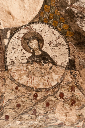 Cappadocia, Turkey - April 29, 2016: Destroyed interior of Church of Three Crosses with early orthodox christian fresco in the Rose Valley in Cappadocia, Turkey, UNESCO World Heritage Siteのeditorial素材