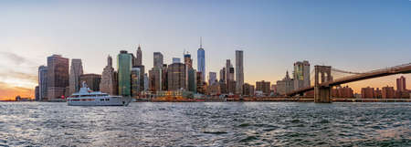 Manhattan skyline and Brooklyn Bridge in New York Cityの写真素材