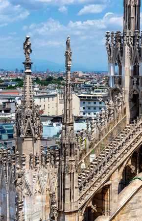 Outside decoration statues of Milan Cathedral (Duomo di Milano), Metropolitan Cathedral-Basilica of the Nativity of Saint Mary. Arieal view. Italyのeditorial素材