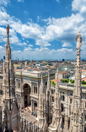 Outside decoration statues of Milan Cathedral (Duomo di Milano), Metropolitan Cathedral-Basilica of the Nativity of Saint Mary. Arieal view. Italyのeditorial素材