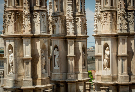Outside decoration statues of Milan Cathedral (Duomo di Milano), Metropolitan Cathedral-Basilica of the Nativity of Saint Mary. Arieal view. Italyのeditorial素材