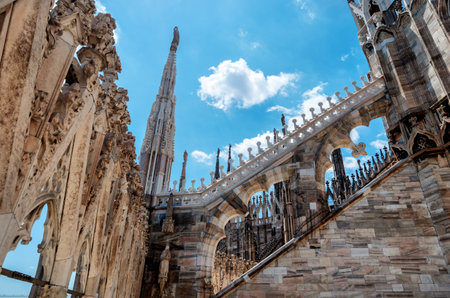 Outside decoration statues of Milan Cathedral (Duomo di Milano), Metropolitan Cathedral-Basilica of the Nativity of Saint Mary. Arieal view. Italyのeditorial素材