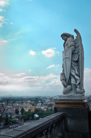 Statue of the Archangel Michael stands on top of Tepeyac Hill near the Basilica of Guadalupe in Mexico Cityの写真素材