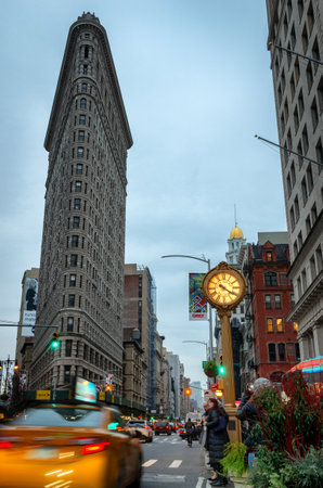 New York City, USA - November 18 2018: Fifth Avenue Clock with the Flatiron Buildingのeditorial素材